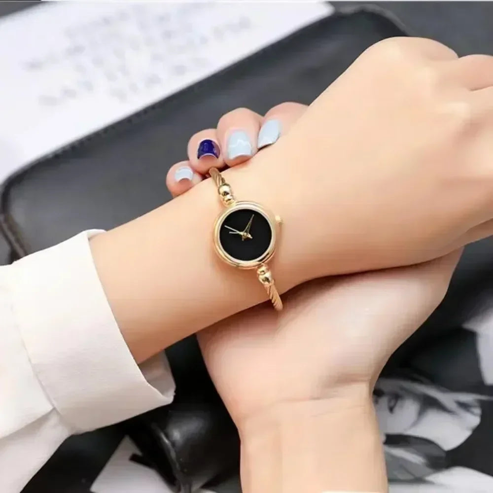Crisluv Women’s Gold Bangle Quartz Watch