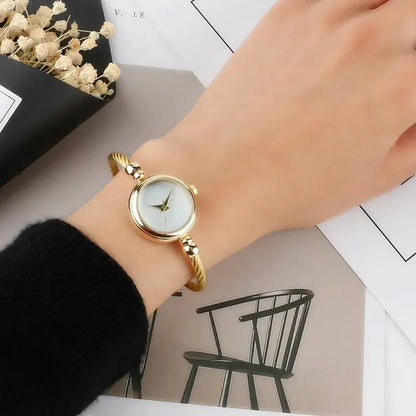 Crisluv Women’s Gold Bangle Quartz Watch